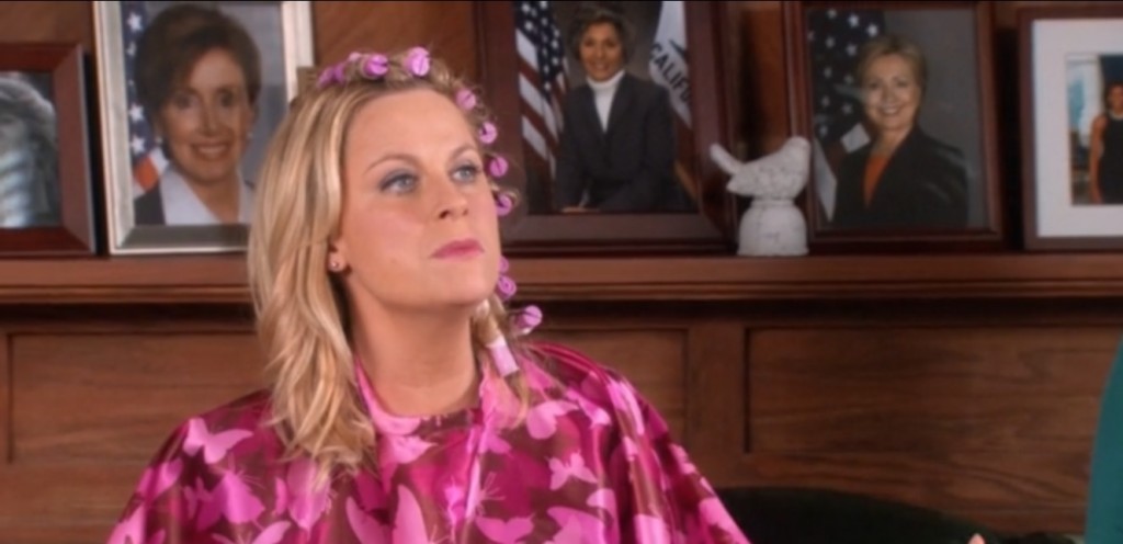 Amy Poehler interpretando a Leslie Knope